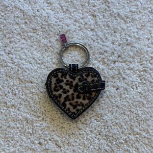 Coach Black Heart Animal Print Keychain. nwot Stored, shipped with Coach tissue.